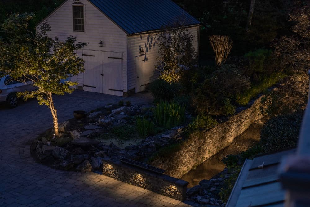 Landscape Lighting in Riegelsville, PA | Illuminating a Historic Mill Race image